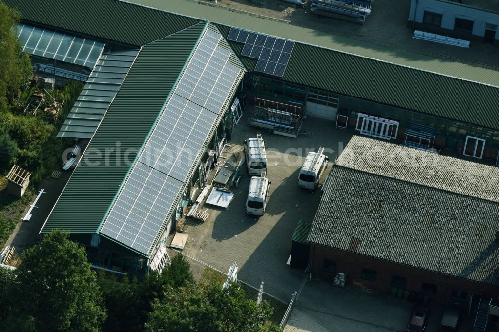 Aerial photograph Munster - Building and production halls on the premises of Busse Alu-Bau GmbH An der Raubkammer in Munster in the state Lower Saxony