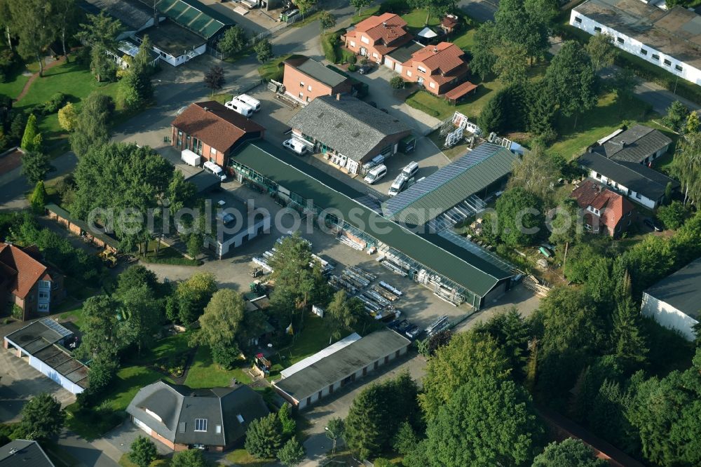 Munster from the bird's eye view: Building and production halls on the premises of Busse Alu-Bau GmbH An der Raubkammer in Munster in the state Lower Saxony