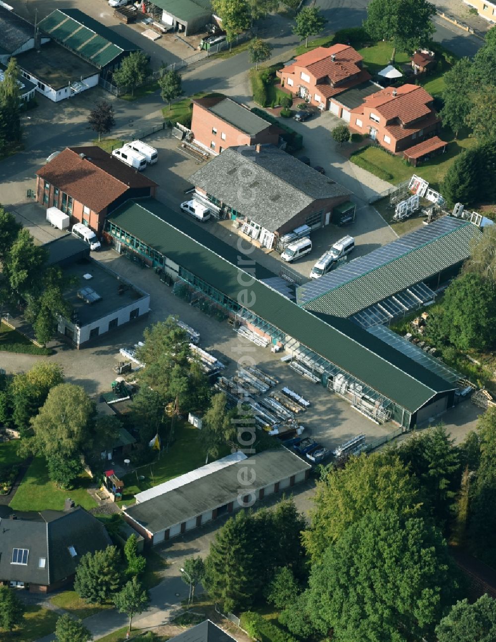 Aerial image Munster - Building and production halls on the premises of Busse Alu-Bau GmbH An der Raubkammer in Munster in the state Lower Saxony