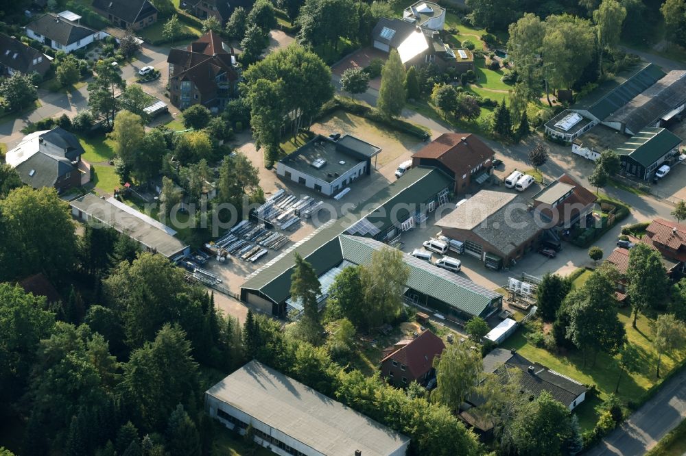 Aerial photograph Munster - Building and production halls on the premises of Busse Alu-Bau GmbH An der Raubkammer in Munster in the state Lower Saxony