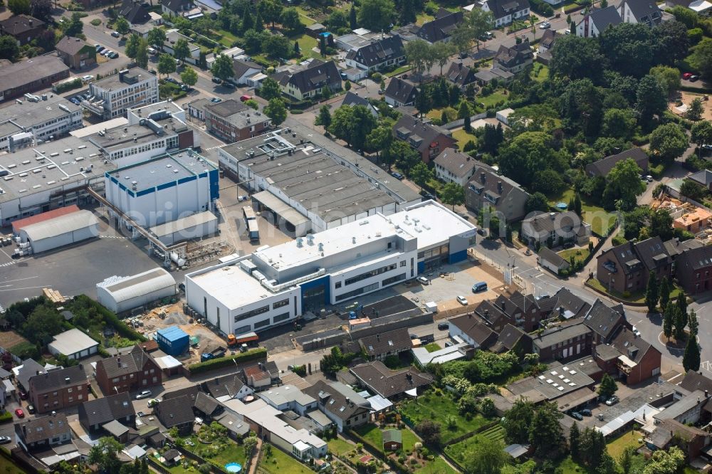 Grevenbroich from the bird's eye view: Building and production halls on the premises of the chemical manufacturers ACTEGA Rhenania on Rhenaniastrasse in the district Wevelinghoven in Grevenbroich in the state North Rhine-Westphalia, Germany