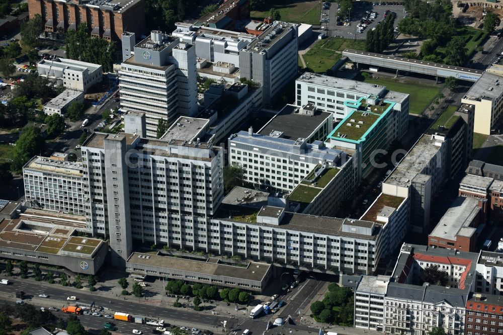 Berlin from the bird's eye view: Building and production halls on the premises of the chemical manufacturers of Bayer Pharma AG on Muellerstrasse in the district Wedding in Berlin, Germany