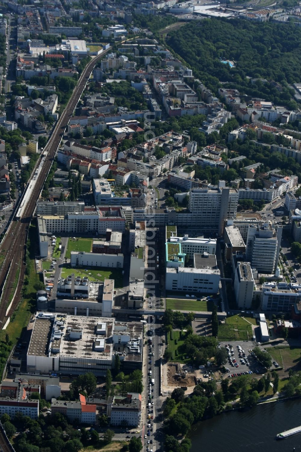 Berlin from the bird's eye view: Building and production halls on the premises of the chemical manufacturers of Bayer Pharma AG on Muellerstrasse in the district Wedding in Berlin, Germany