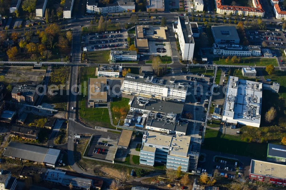 Berlin from the bird's eye view: Building and production halls on the premises of the chemical manufacturers Berlin Chemie AG in the district Adlershof in Berlin, Germany