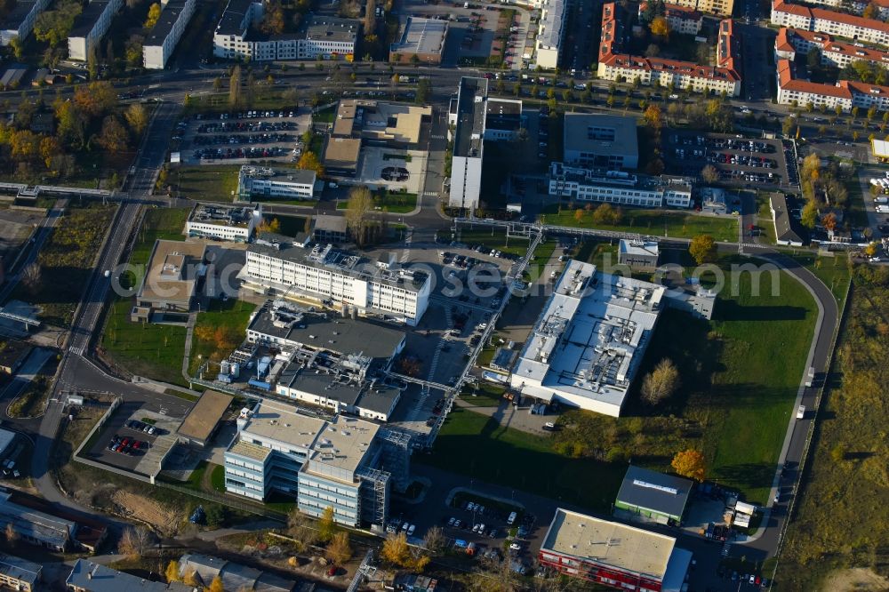 Aerial image Berlin - Building and production halls on the premises of the chemical manufacturers Berlin Chemie AG in the district Adlershof in Berlin, Germany