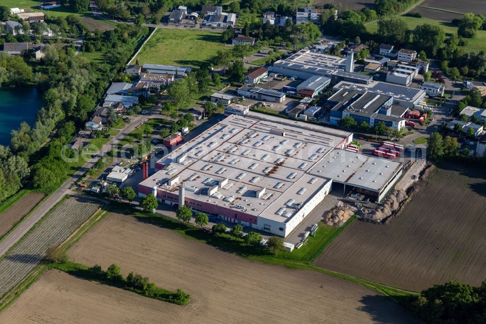 Aerial photograph Neureut - Building and production halls on the premises of Coca-Cola European Partners Deutschland GmbH in Neureut in the state Baden-Wuerttemberg, Germany