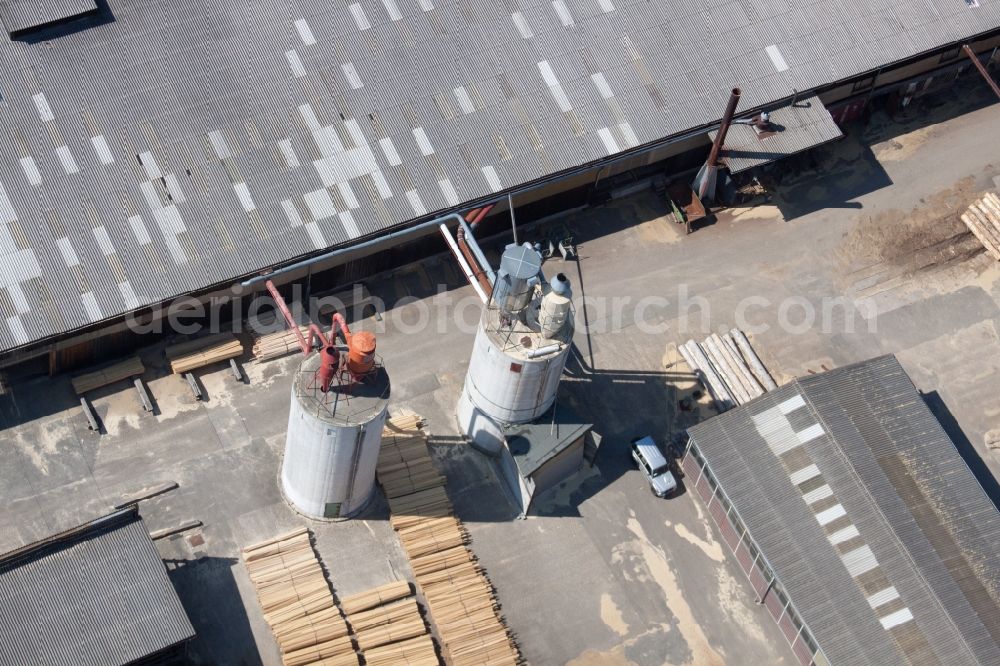 Marxzell from the bird's eye view: Building and production halls on the premises of corthum Nordschwarzwald GmbH - corthum Erdenwerk in the district Pfaffenrot in Marxzell in the state Baden-Wuerttemberg