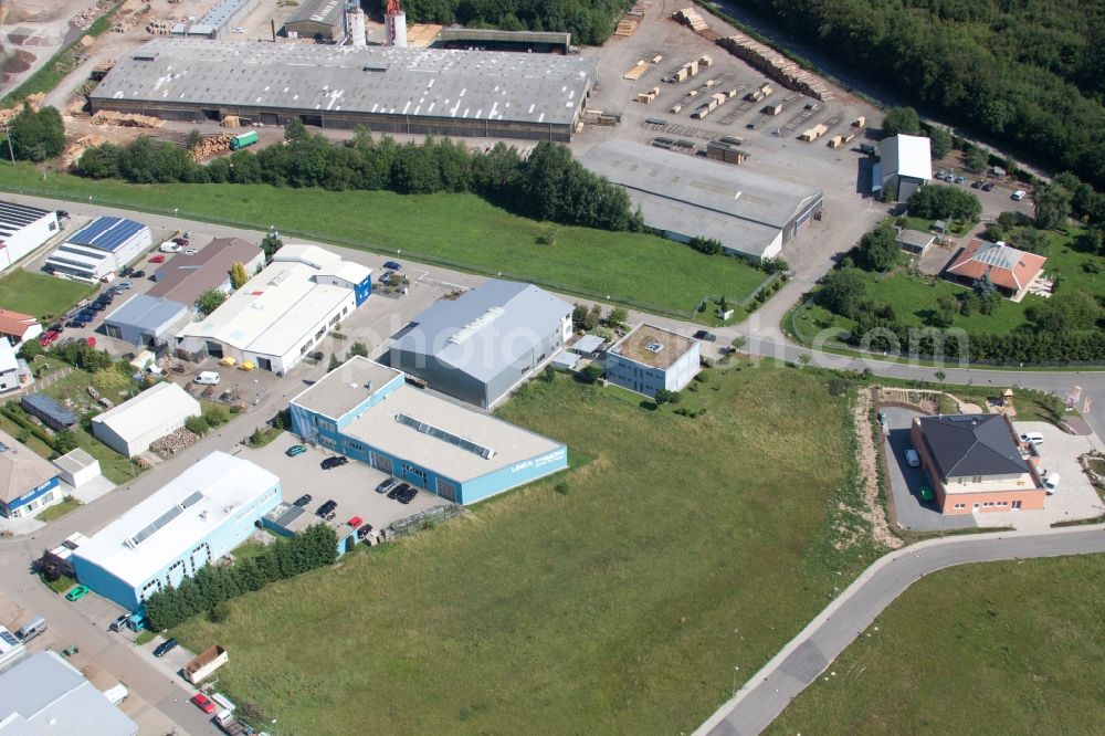 Marxzell from the bird's eye view: Building and production halls on the premises of corthum Nordschwarzwald GmbH - corthum Erdenwerk in the district Pfaffenrot in Marxzell in the state Baden-Wuerttemberg