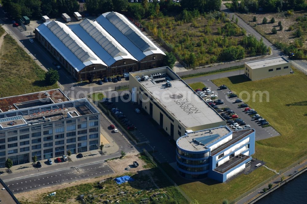 Berlin from the bird's eye view: Building and production hall on the premises of of First Sensor AG on Peter-Behrens-Strasse in Berlin, Germany