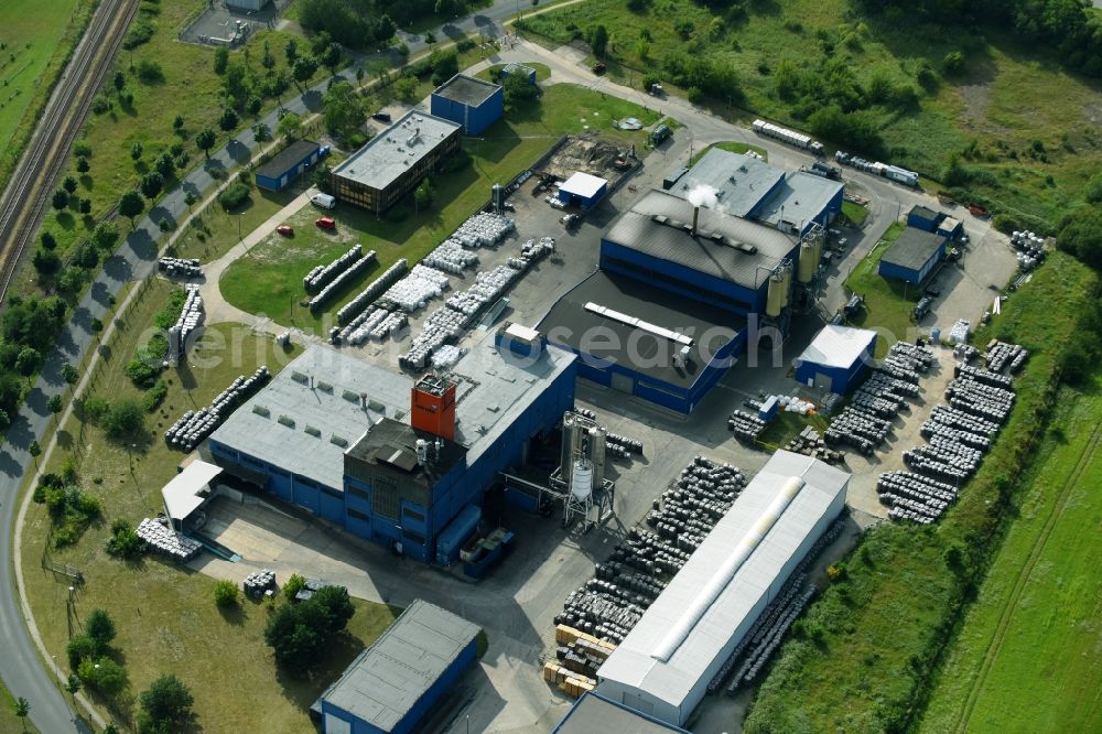 Premnitz from the bird's eye view: Building and production halls on the premises of of Jacobi Carbons Service (Europe) GmbH on Vistrastrasse in Premnitz in the state Brandenburg, Germany