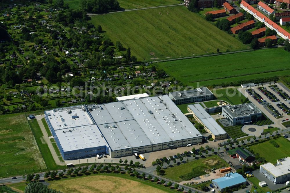 Cuxhaven from above - Building and production halls on the premises of of VOCO GmbH on Anton-Flettner-Strasse in Cuxhaven in the state Lower Saxony, Germany