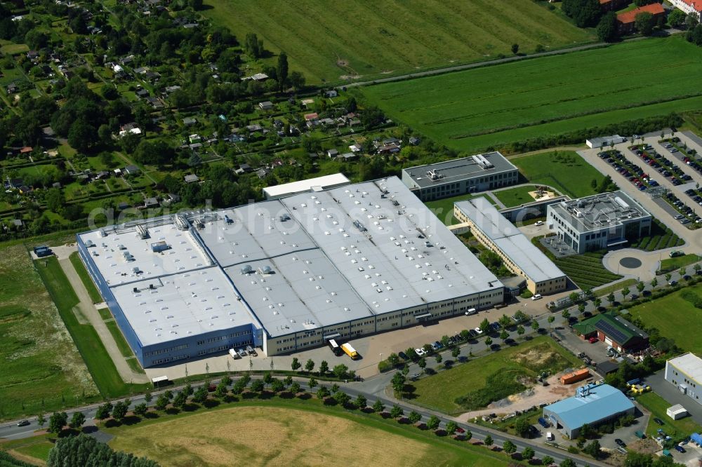 Cuxhaven from the bird's eye view: Building and production halls on the premises of of VOCO GmbH on Anton-Flettner-Strasse in Cuxhaven in the state Lower Saxony, Germany