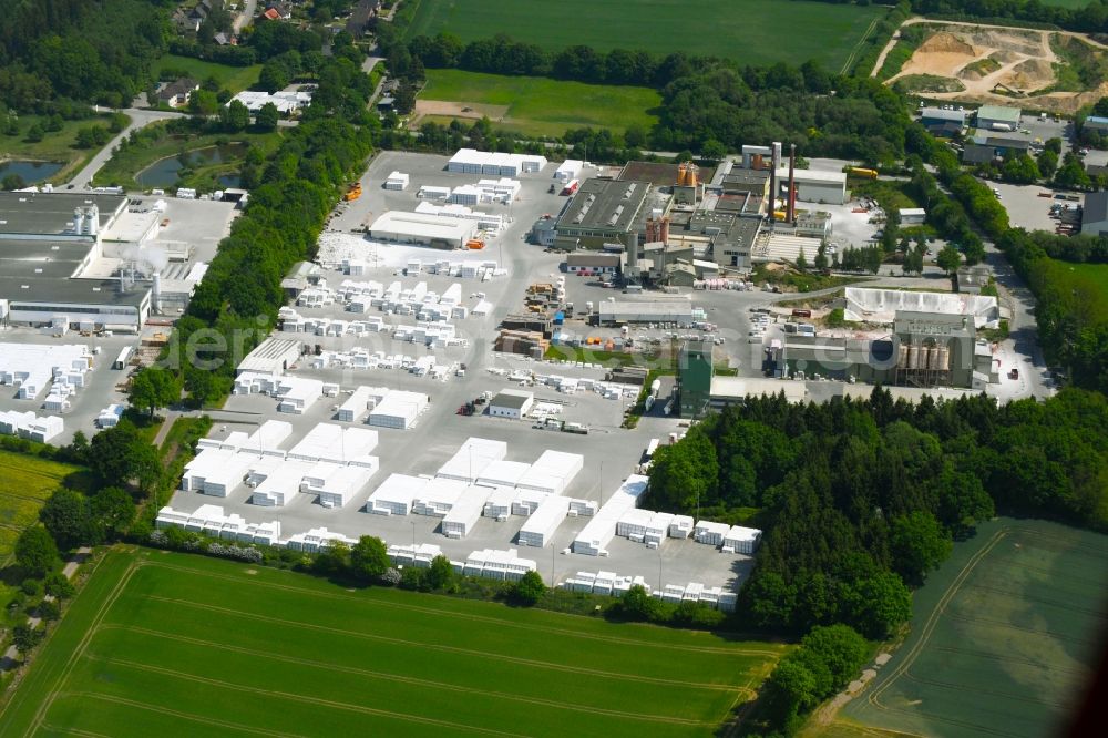 Wittenborn from the bird's eye view: Building and production halls on the premises of H+H Deutschland GmbH on Industriestrasse in Wittenborn in the state Schleswig-Holstein, Germany