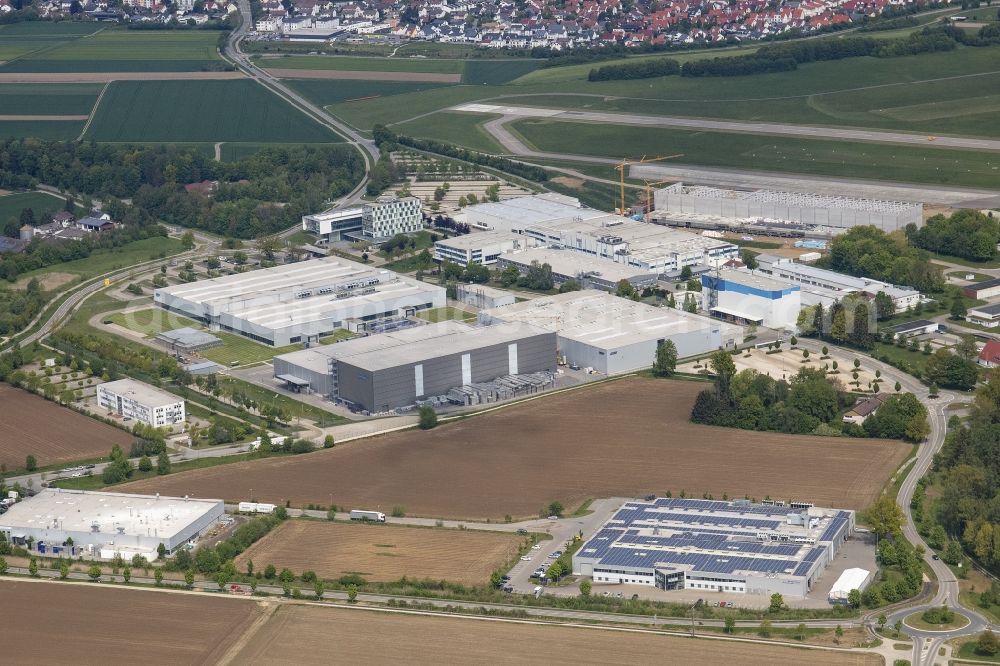 Laupheim from the bird's eye view: Building and production halls on the premises of Diehl-Aviation Am Flugplatz in the district Untersulmetingen in Laupheim in the state Baden-Wurttemberg, Germany