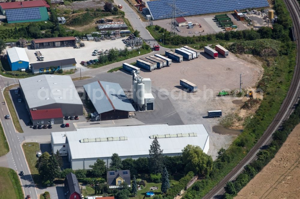 Maxhütte-Haidhof from the bird's eye view: Building and production halls on the premises MK Dienstleistungs GmbH & Co. KG along Obagstrasse in Maxhuette-Haidhof in the state Bavaria, Germany