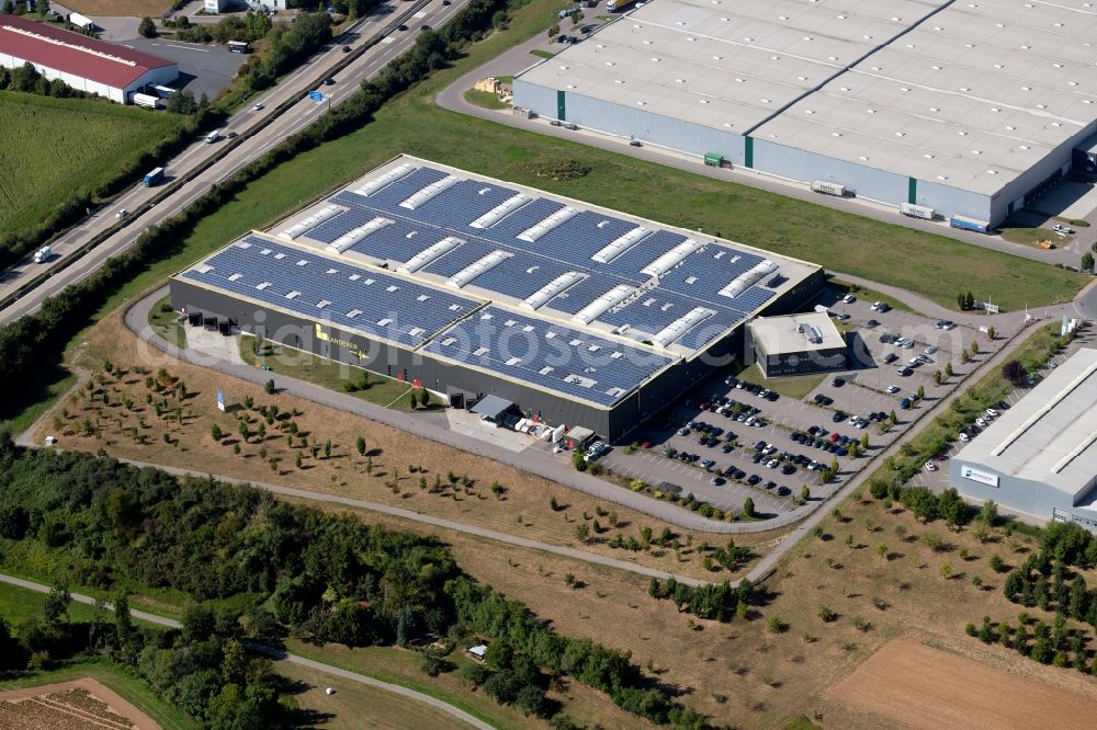 Neuenstadt am Kocher from the bird's eye view: Buildings and production halls on the factory premises of the offset printing of A. Lanofer GmbH & Co. KG (Autajon Group) in of Heinz-Lanofer-Strasse in Neuenstadt am Kocher in the state Baden-Wurttemberg, Germany