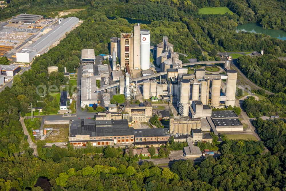 Neubeckum from the bird's eye view: Building and production halls on the premises of Dyckerhoff Zementwerk in Neubeckum in the state North Rhine-Westphalia, Germany