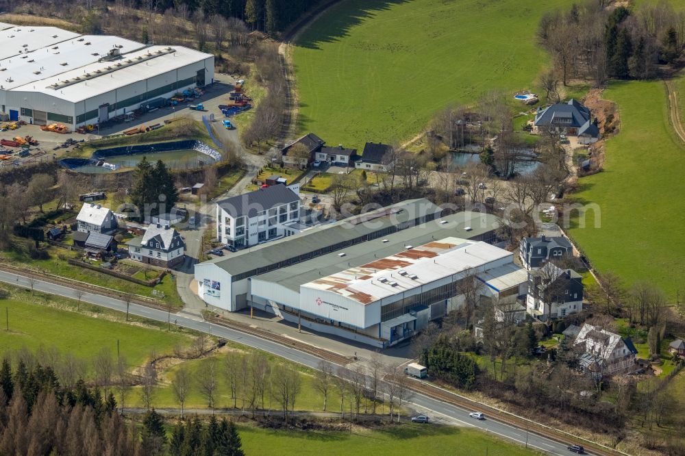 Aerial image Erndtebrück - Buildings and production halls on the factory premises of EEW Pipe Production Erndtebrueck GmbH & Co. KG (EEW PPE) on the street Im Gruenewald in Erndtebrueck in Siegerland in the federal state of North Rhine-Westphalia, Germany