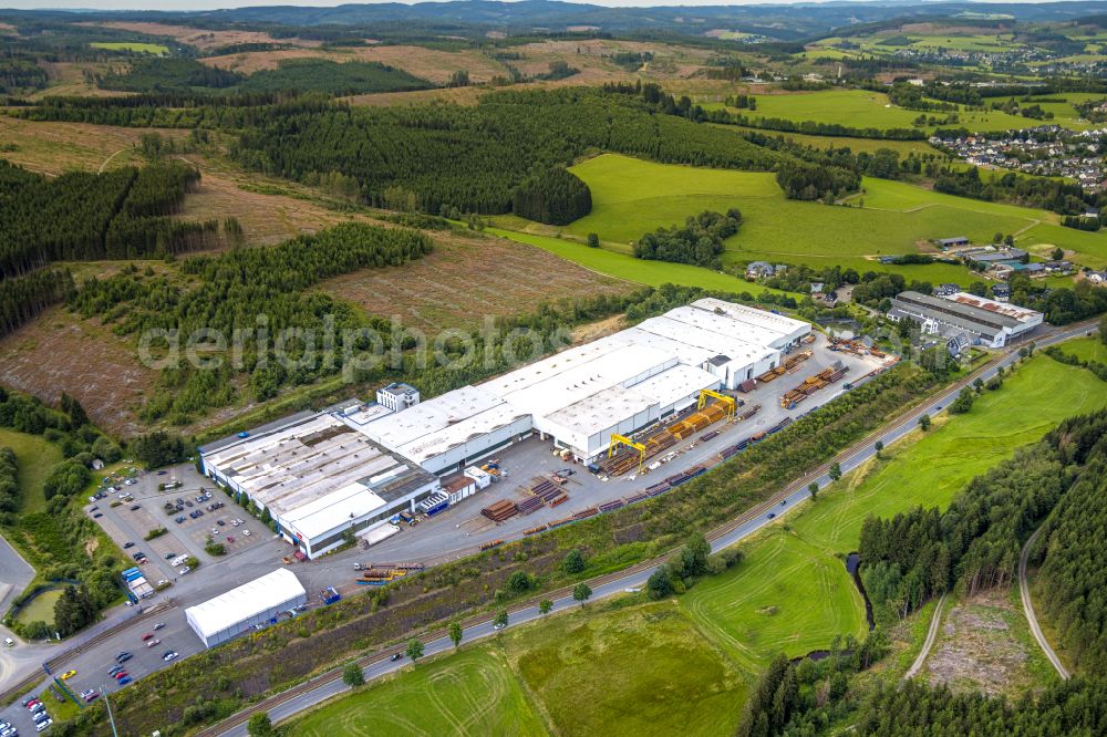 Erndtebrück from the bird's eye view: Buildings and production halls on the factory premises of EEW Pipe Production Erndtebrueck GmbH & Co. KG (EEW PPE) on the street Im Gruenewald in Erndtebrueck in Siegerland in the federal state of North Rhine-Westphalia, Germany