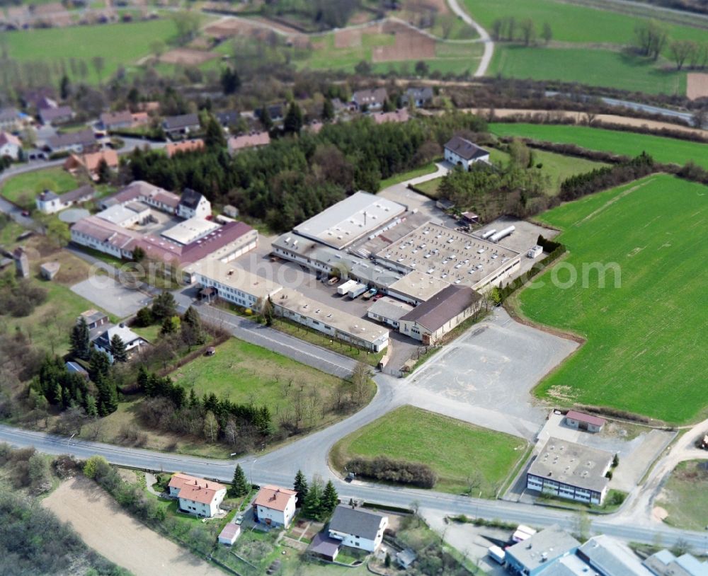 Aerial photograph Münnerstadt - Building and production halls on the premises of the former MGlas AG in the district Grosswenkheim in Muennerstadt in the state Bavaria, Germany