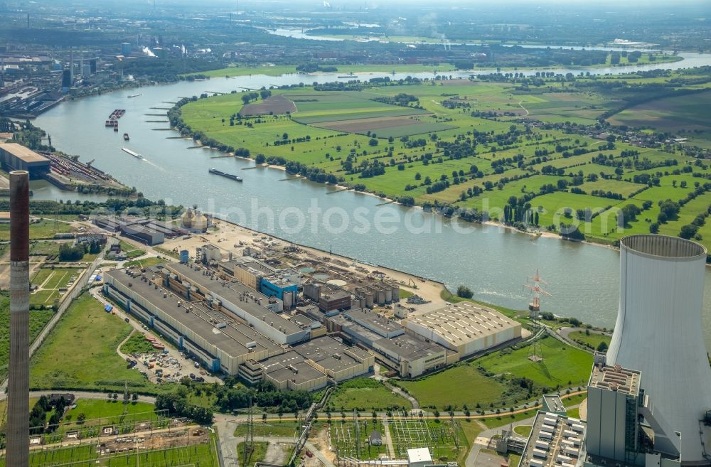 Duisburg from the bird's eye view: Building and production halls on the premises of ehemaligen Papierfabrik Norske Skog and of Papierfabrik Haindl in the district Walsum in Duisburg in the state North Rhine-Westphalia, Germany