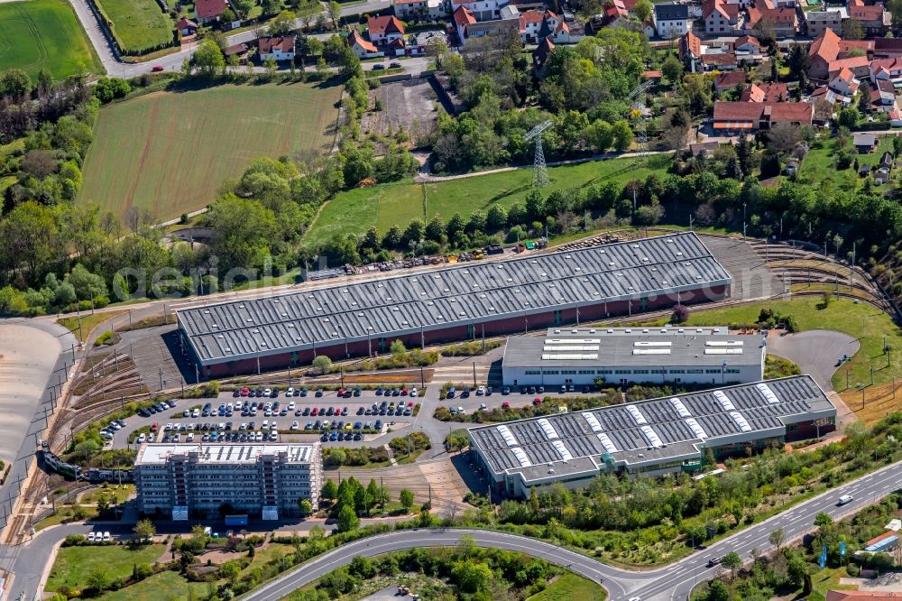 Erfurt from the bird's eye view: Buildings and production halls on the factory premises Erfurter Verkehrsbetriebe AG at the Urbicher Kreuz in the district of Windischholzhausen in Erfurt in the state Thuringia, Germany