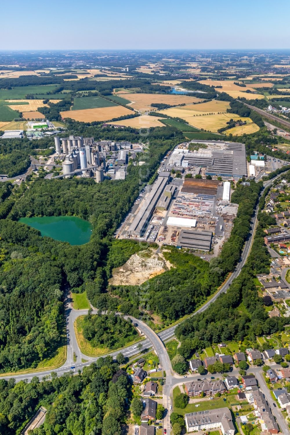 Neubeckum from the bird's eye view: Building and production halls on the premises of Eternit GmbH in Neubeckum in the state North Rhine-Westphalia, Germany