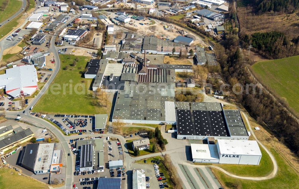 Schmallenberg from above - Building and production halls on the premises of FALKE KGaA Auf of Lake in Schmallenberg in the state North Rhine-Westphalia, Germany