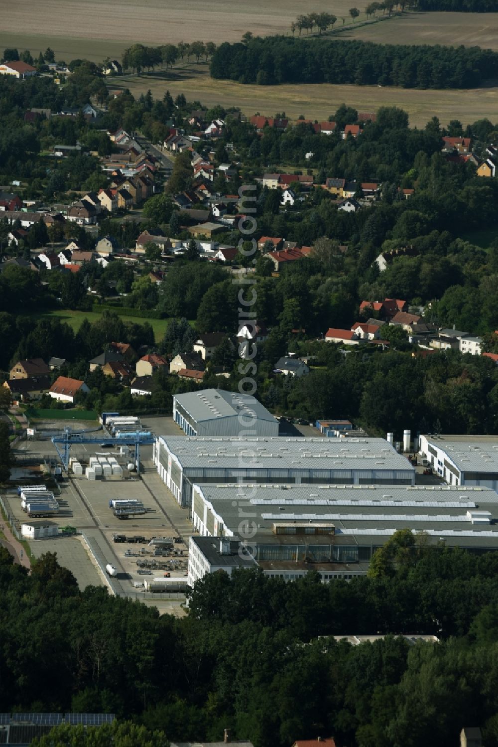 Lutherstadt Wittenberg from the bird's eye view: Building and production halls on the premises of Feldbinder Spezialfahrzeugwerke GmbH (Werk Wittenberg) in Lutherstadt Wittenberg in the state Saxony-Anhalt