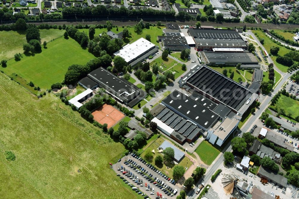 Schwarzenbek from above - Building and production halls on the premises of Fette Compacting GmbH along the Grabauer Strasse in Schwarzenbeck in the state Schleswig-Holstein, Germany