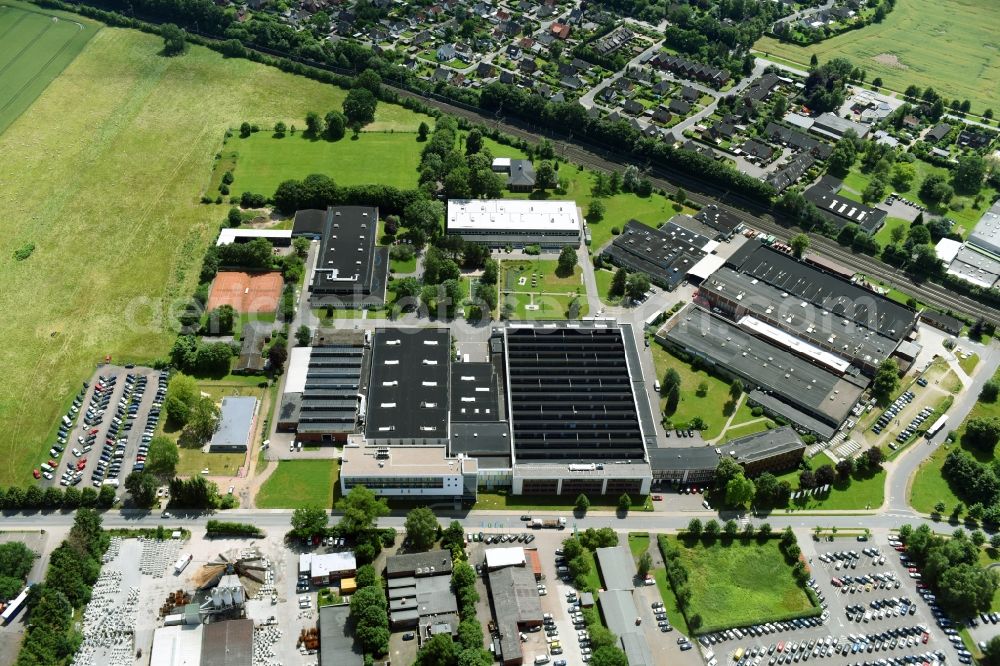 Schwarzenbek from above - Building and production halls on the premises of Fette Compacting GmbH along the Grabauer Strasse in Schwarzenbeck in the state Schleswig-Holstein, Germany