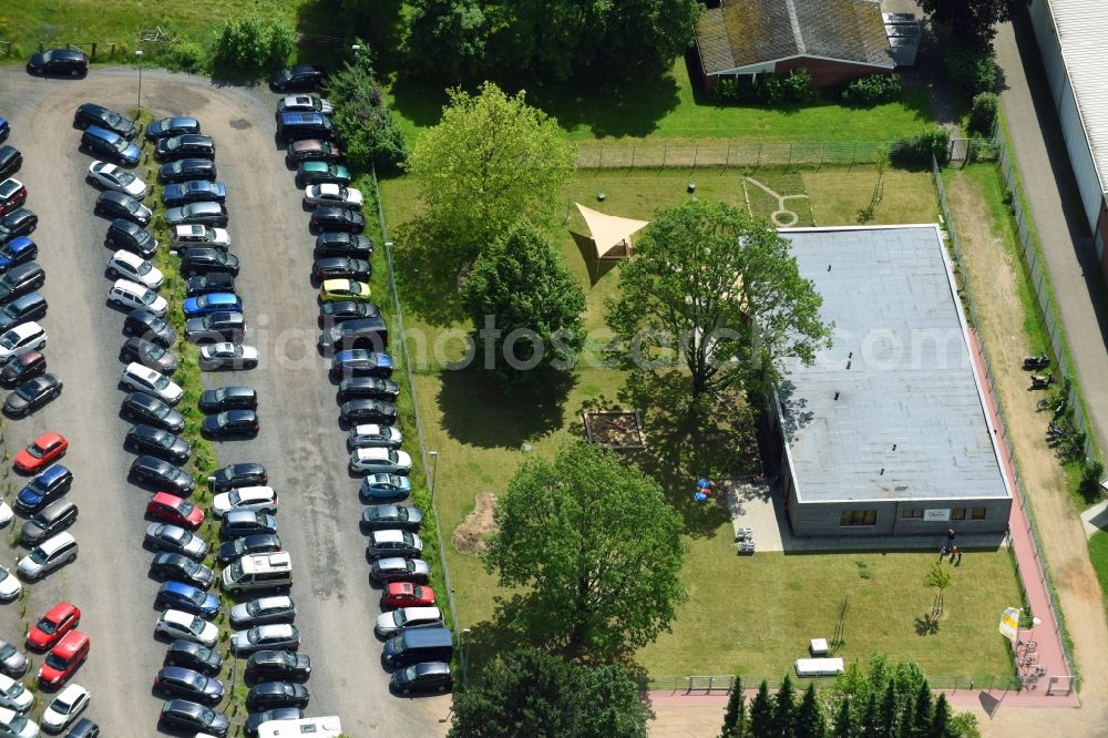 Schwarzenbek from above - Building and production halls on the premises of Fette Compacting GmbH along the Grabauer Strasse in Schwarzenbeck in the state Schleswig-Holstein, Germany