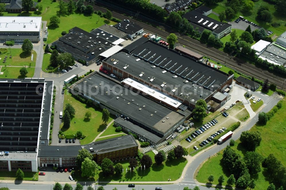 Schwarzenbek from above - Building and production halls on the premises of Fette Compacting GmbH along the Grabauer Strasse in Schwarzenbeck in the state Schleswig-Holstein, Germany