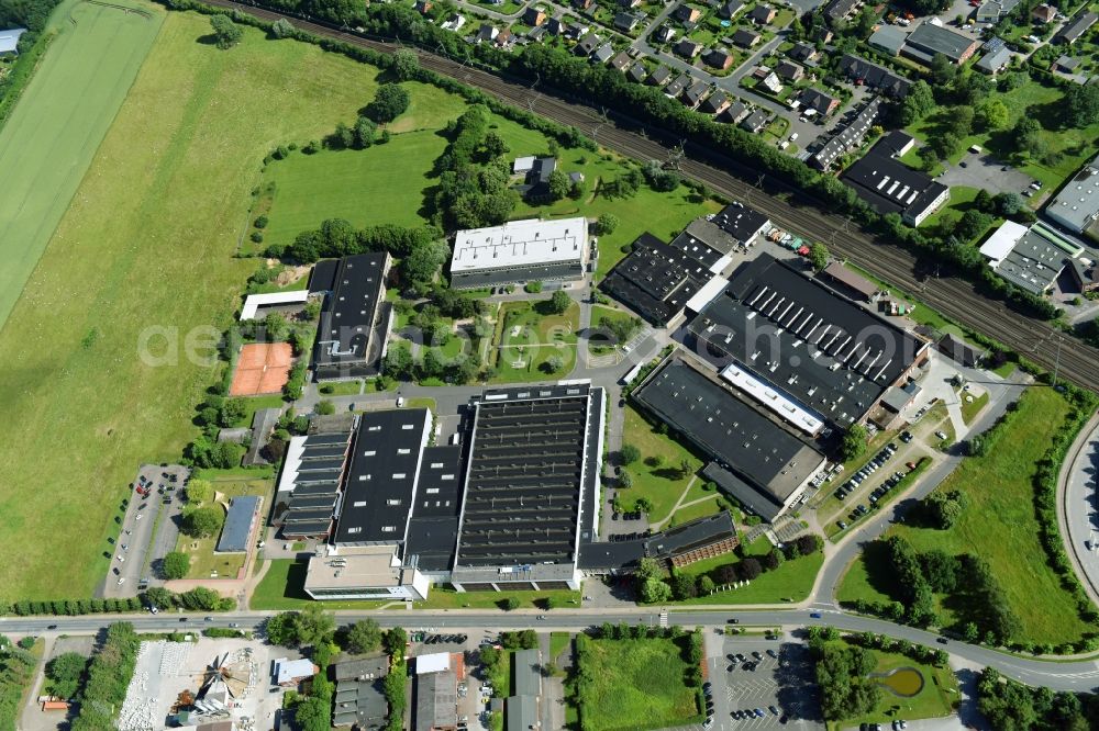 Schwarzenbek from above - Building and production halls on the premises of Fette Compacting GmbH along the Grabauer Strasse in Schwarzenbeck in the state Schleswig-Holstein, Germany