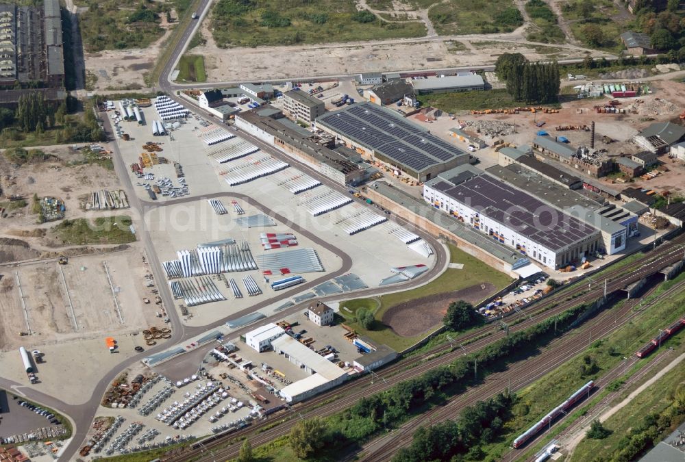 Magdeburg from above - Premises of the wind turbine manufacturer ENERCON GmbH in Magdeburg in Saxony-Anhalt. In the image pre-assembled sections in semi-monocoque construction of the wind turbine manufacture