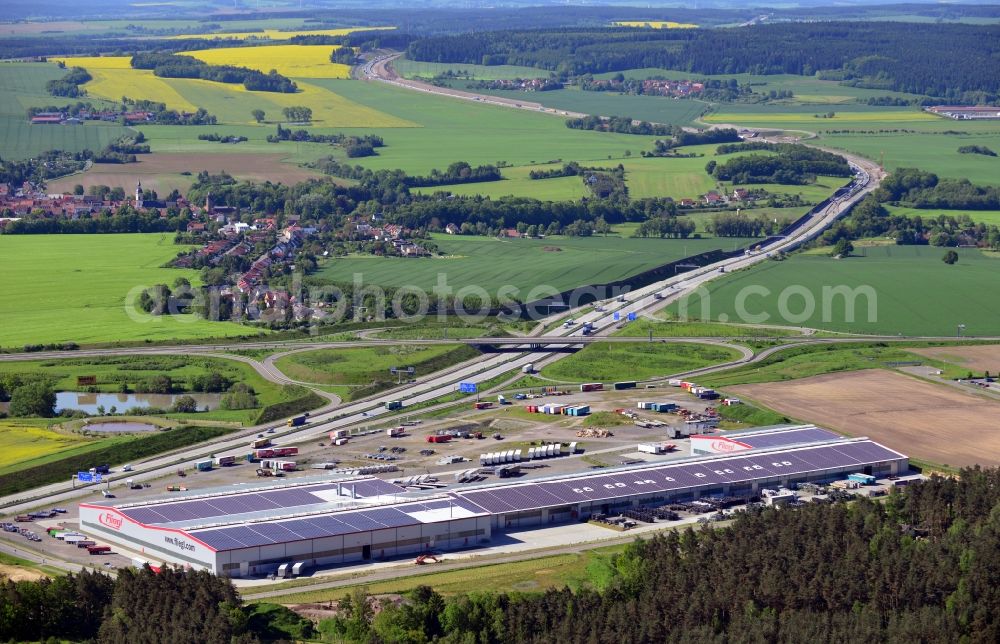 Aerial image Triptis - Manufacturing location of utility vehicle company Fliegl at Oberpoellnitzer Strasse in town Triptis, Thuringia. Fliegl-group has domestic and abroad production sites for vehicle construction, structural engineering and agricultural engineering. It is one of the biggest companies of this type in Germany