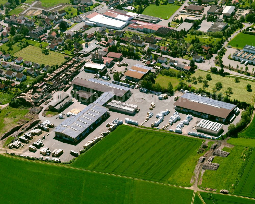 Wain from above - Building and production halls on the factory premises of the company Holzwerk Baur GmbH on Gartenstrasse in Wain in the state Baden-Wuerttemberg, Germany