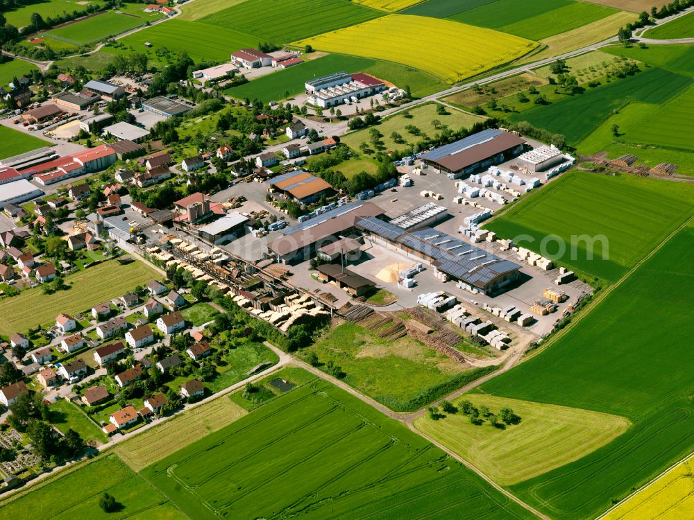 Wain from the bird's eye view: Building and production halls on the factory premises of the company Holzwerk Baur GmbH on Gartenstrasse in Wain in the state Baden-Wuerttemberg, Germany