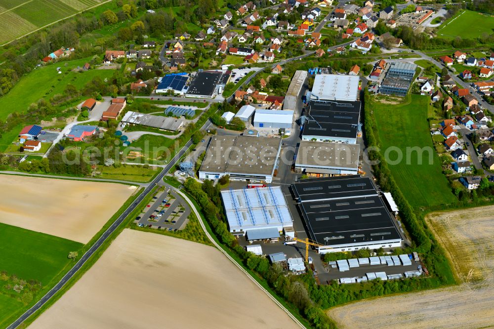 Aerial image Prichsenstadt - Buildings and production halls on the factory premises of the company MERO-TSK International GmbH & Co. KG Wuerzburg adjacent to agricultural areas on the outskirts of Prichsenstadt in the state Bavaria, Germany