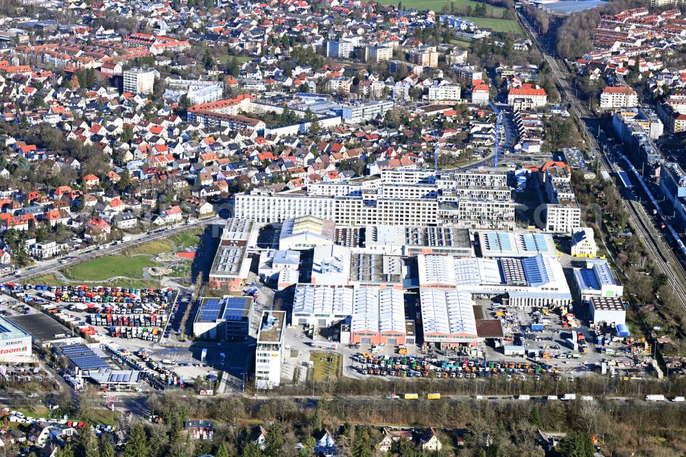 München from above - Building and production halls on the premises of Franz Xaver Meiller Fahrzeug- and Maschinenfabrik - GmbH & Co KG on Ambossstrasse on street Ambossstrasse in the district Moosach in Munich in the state Bavaria, Germany