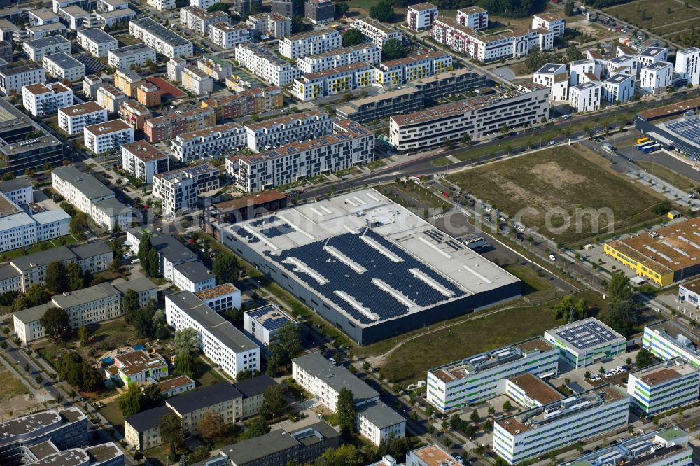 Aerial image Berlin - Building and production halls on the premises of Freudenberg Dichtungs- and Schwingungstechnik GmbH on Gross-Berliner Donm in the district Adlershof in Berlin, Germany