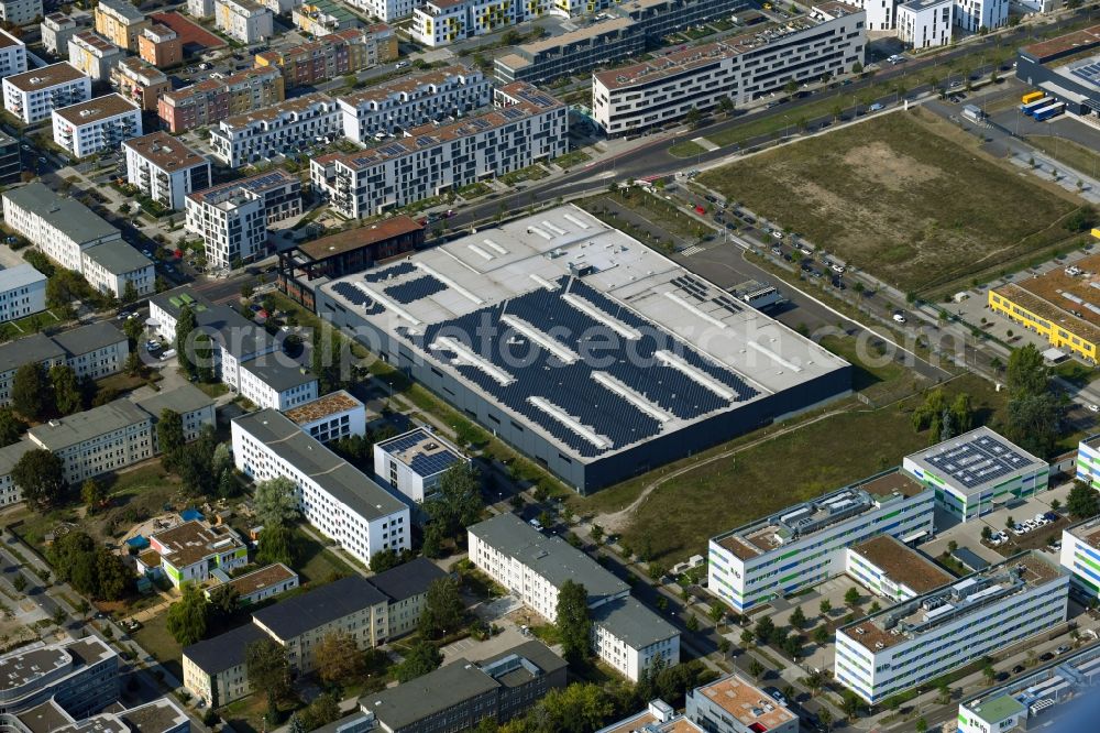 Aerial photograph Berlin - Building and production halls on the premises of Freudenberg Dichtungs- and Schwingungstechnik GmbH on Gross-Berliner Donm in the district Adlershof in Berlin, Germany