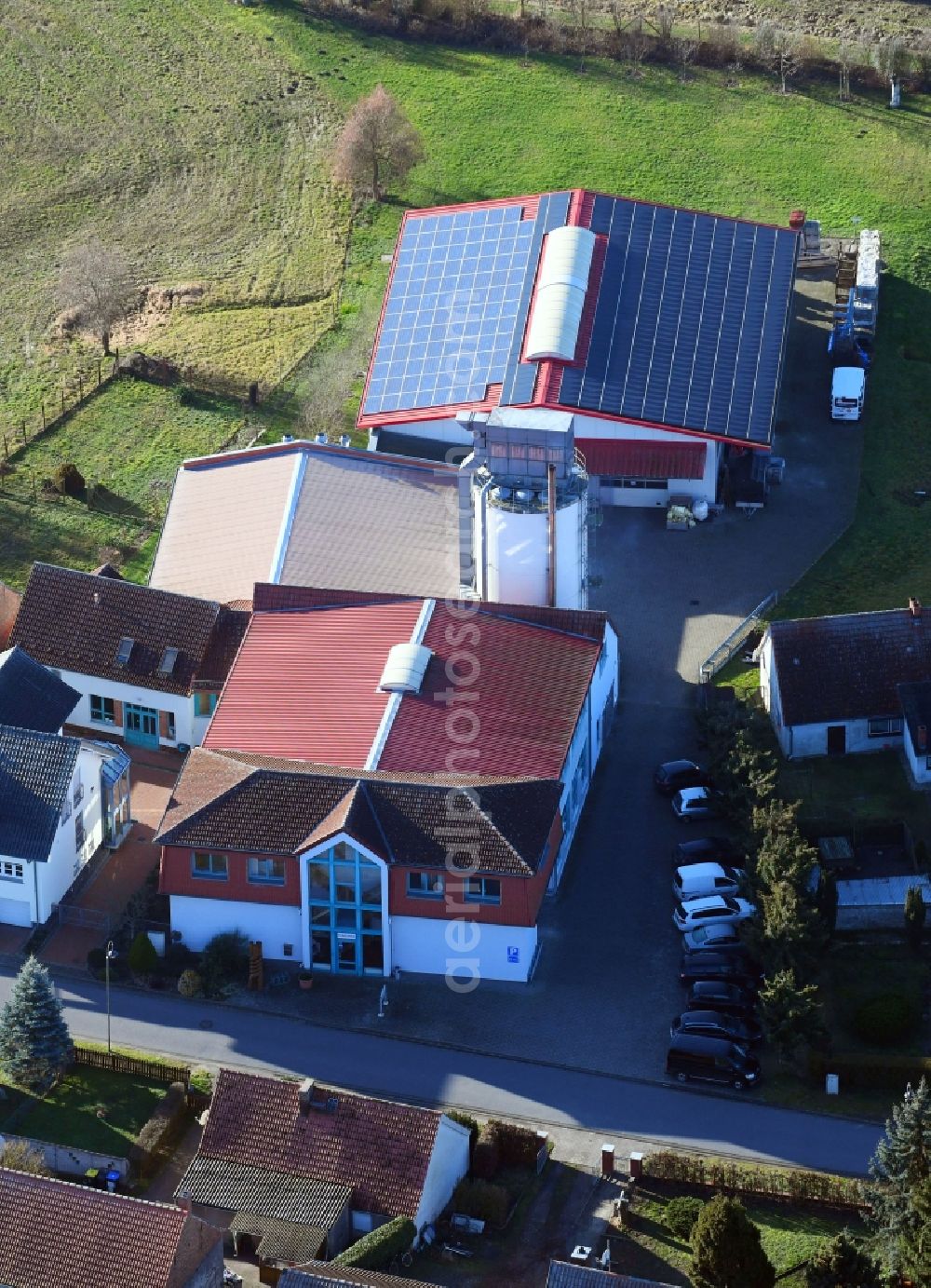 Altlüdersdorf from above - Building and production halls on the premises of Fritz Mueller Massivholztreppen GmbH & Co. KG on Gasse in Altluedersdorf in the state Brandenburg, Germany