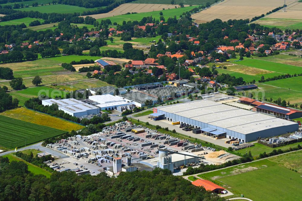 Meitze from the bird's eye view: Building and production halls on the premises of Gala-Lusit-Betonsteinwerke GmbH on street Bremer Weg in Meitze in the state Lower Saxony, Germany