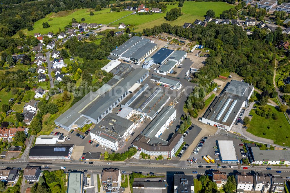 Gevelsberg from the bird's eye view: Building and production halls on the premises of TS Gesellschaft fuer Transport- and Sicherungssysteme mbH with the Peddinghaus on Hasslinghauser Strasse in Gevelsberg in the state North Rhine-Westphalia, Germany