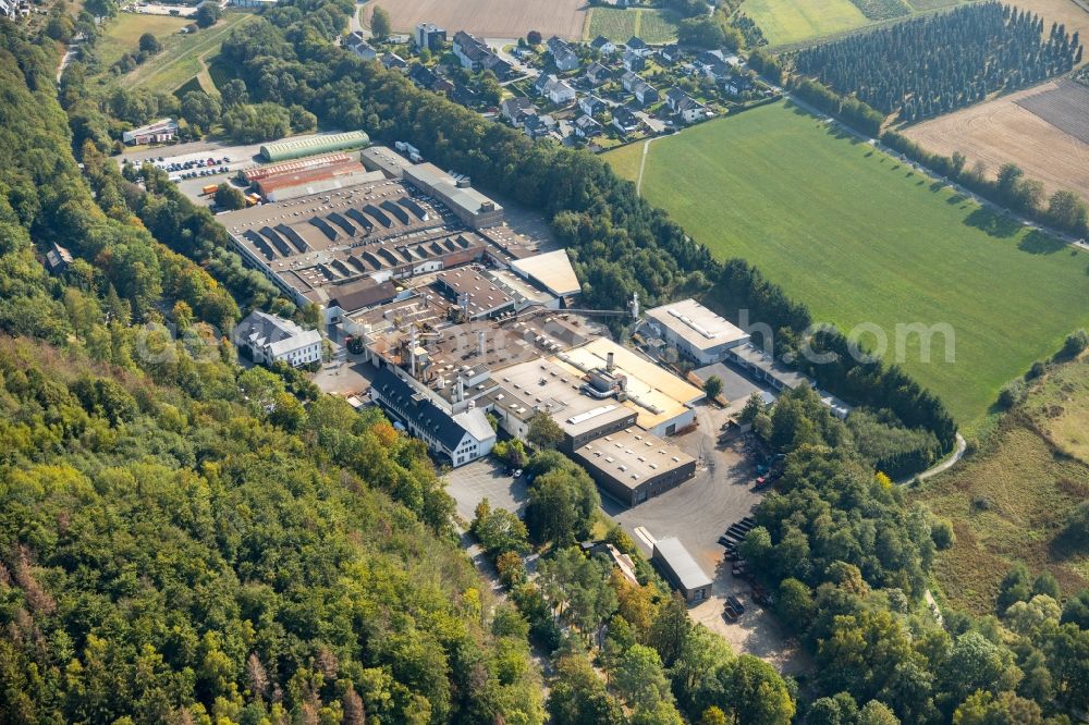 Aerial photograph Olsberg - Building and production halls on the premises of Olsberg GmbH in Olsberg in the state North Rhine-Westphalia, Germany