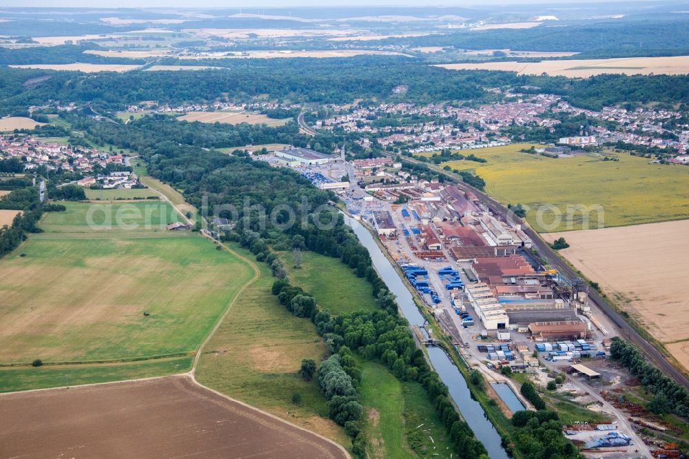 Foug from above - Building and production halls on the premises of Foundery Saint Gobain PAM on Canal de la Marne au Rhin in Foug in Grand Est, France