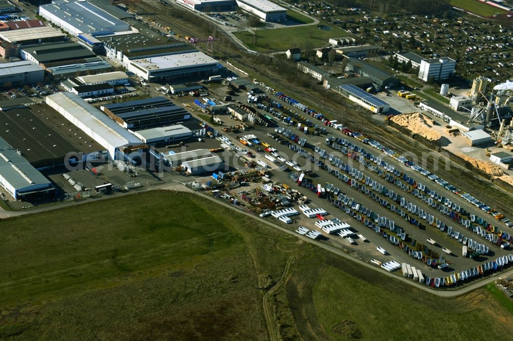 Gotha from the bird's eye view: Buildings, production halls and truck trailer parking space on the factory premises of Gothaer Fahrzeugtechnik GmbH on Fliegerstrasse in Gotha in the state Thuringia, Germany