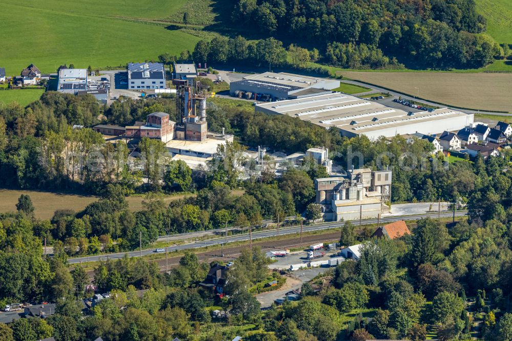 Aerial photograph Grevenbrück - Building and production halls on the premises of the Grevenbruecker Kalkwerk GmbH & Co. KG on street Kalkwerkstrasse in Grevenbrueck in the state North Rhine-Westphalia, Germany