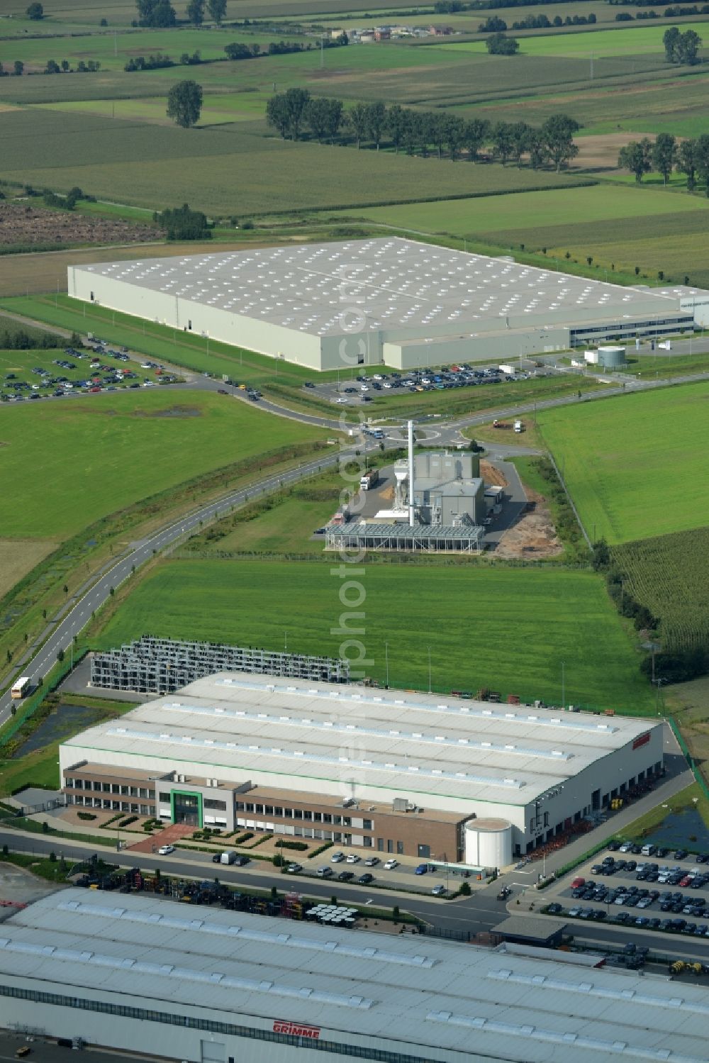 Rieste from above - Building and production halls on the premises of Grimme Landmaschinen GmbH & Co. KG in the industrial area Niedersachsenpark in Rieste in the state Lower Saxony